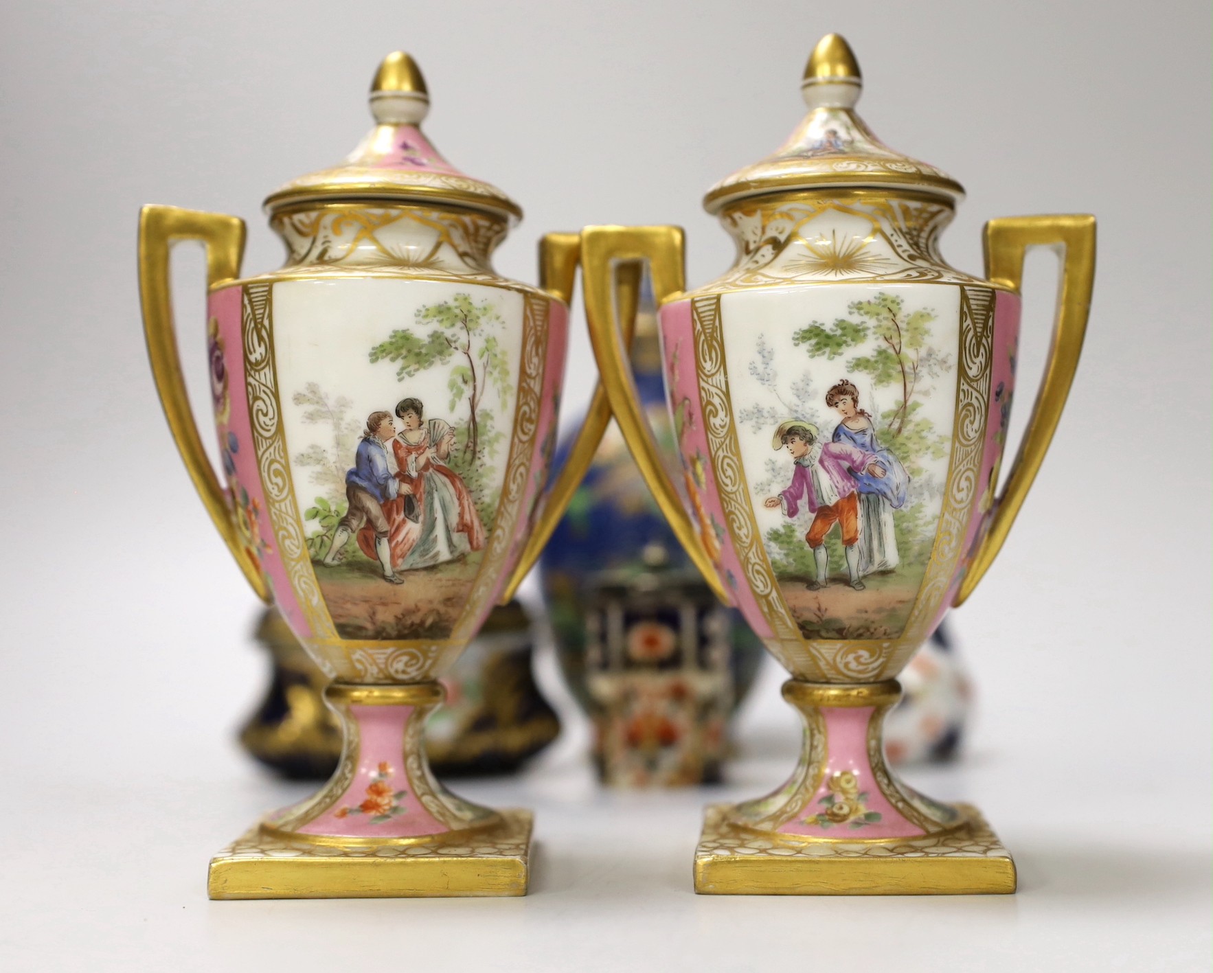 A pair of Vienna style porcelain pink ground vases, late 19th century, a Sevres style trinket box, and other ceramics. Tallest 16cm
